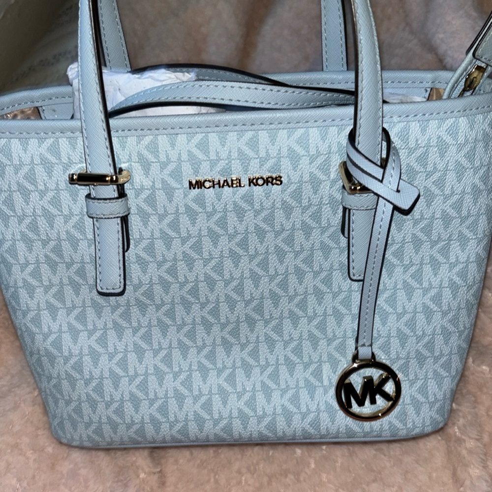 Brand new Michael Kors store with tags